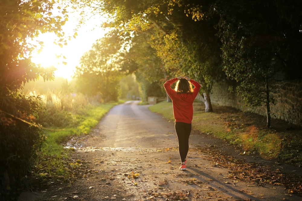 Runner checking a fitness tracker